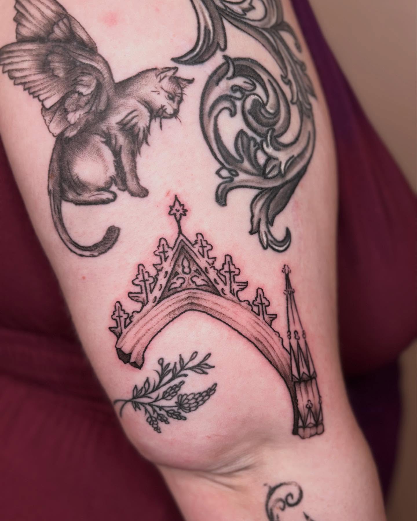 Cat with wings black and grey tattoo on the forearm by π»πΈπ½π½, Ypsilanti, Michigan