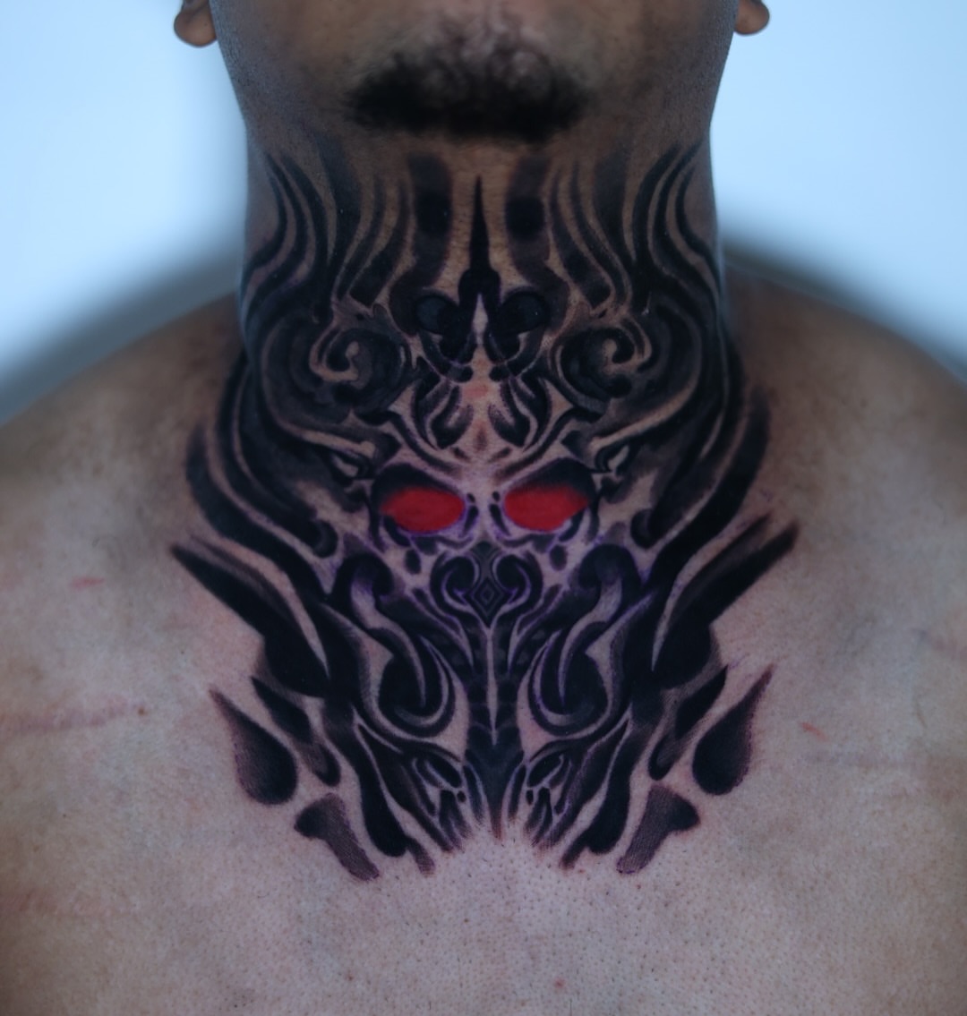 Tattoo by @tiagoink__ — tribal, dark_realism