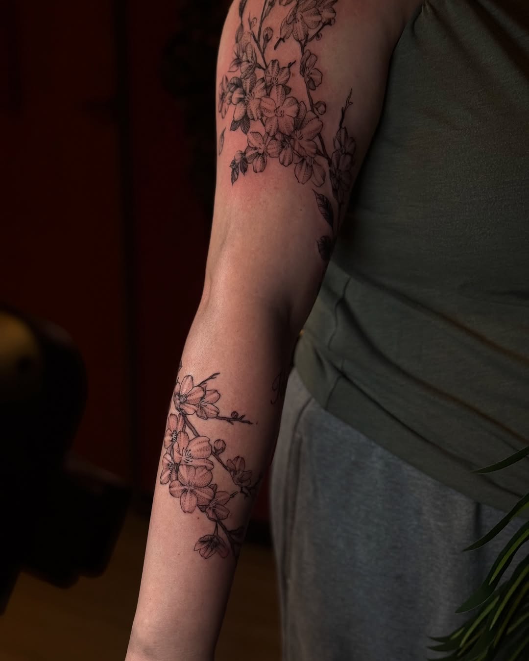 Cherry blossoms fine line tattoo on the forearm by Gabby Finearts