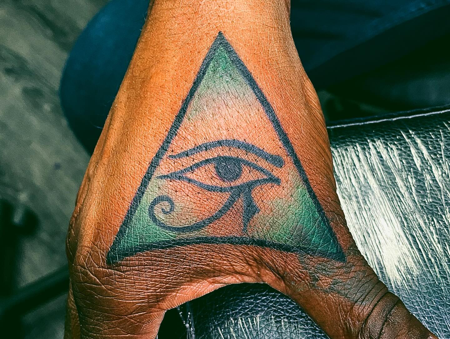 Eye of horus geometric tattoo on the forearm by Tiffany