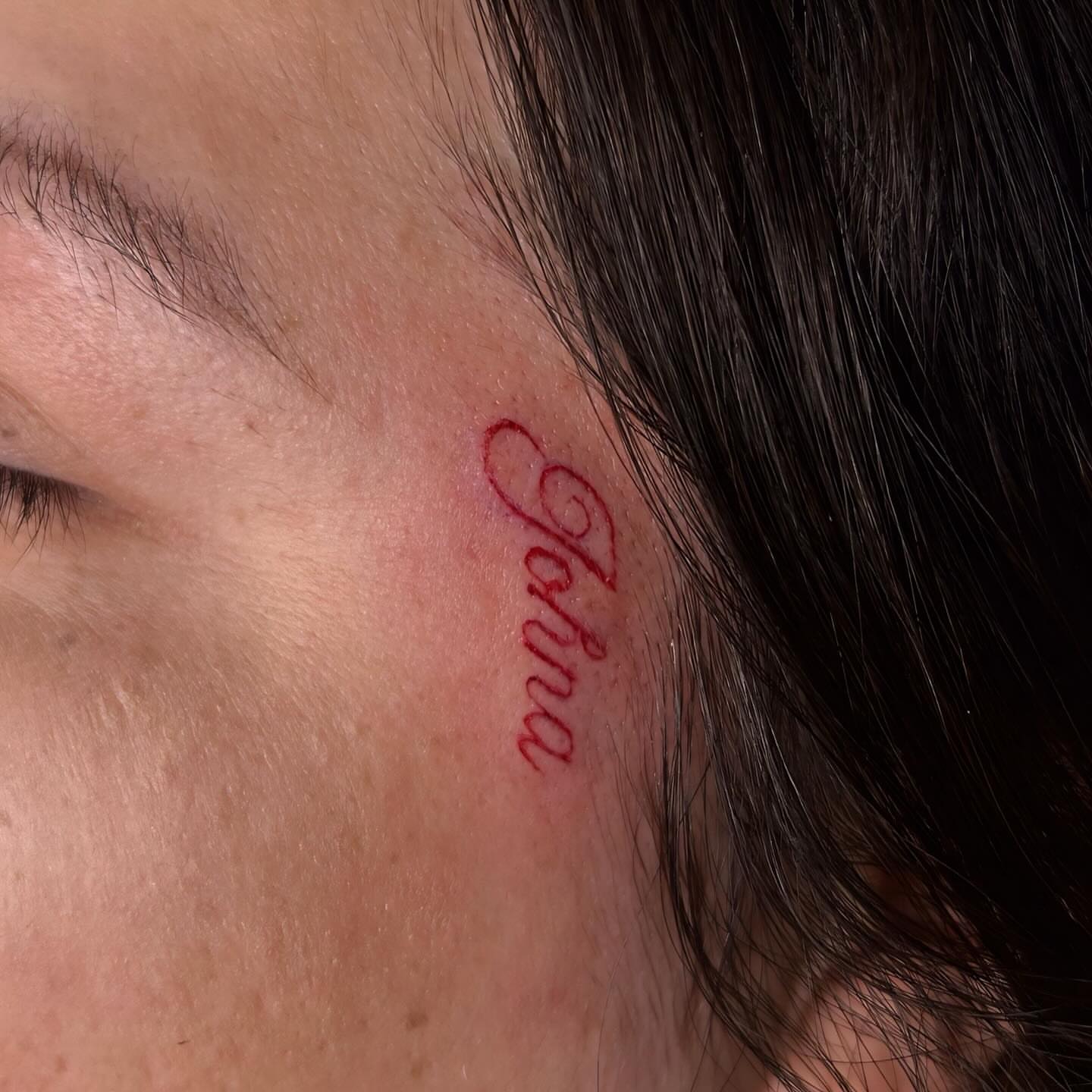 Script lettering lettering script tattoo on the neck by Victoria Mendez