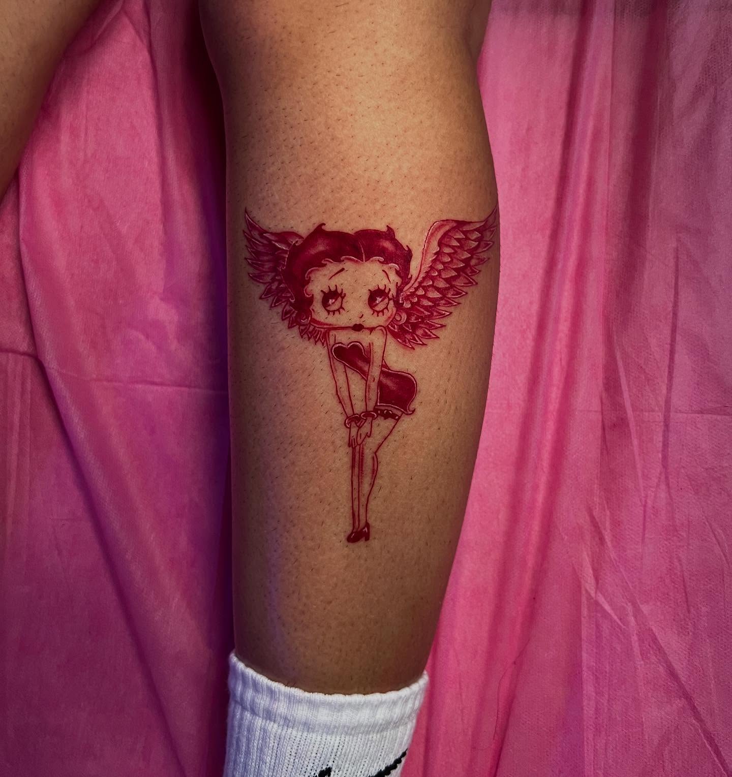 Betty Boop illustrative tattoo on the forearm by Jasmin Lozano