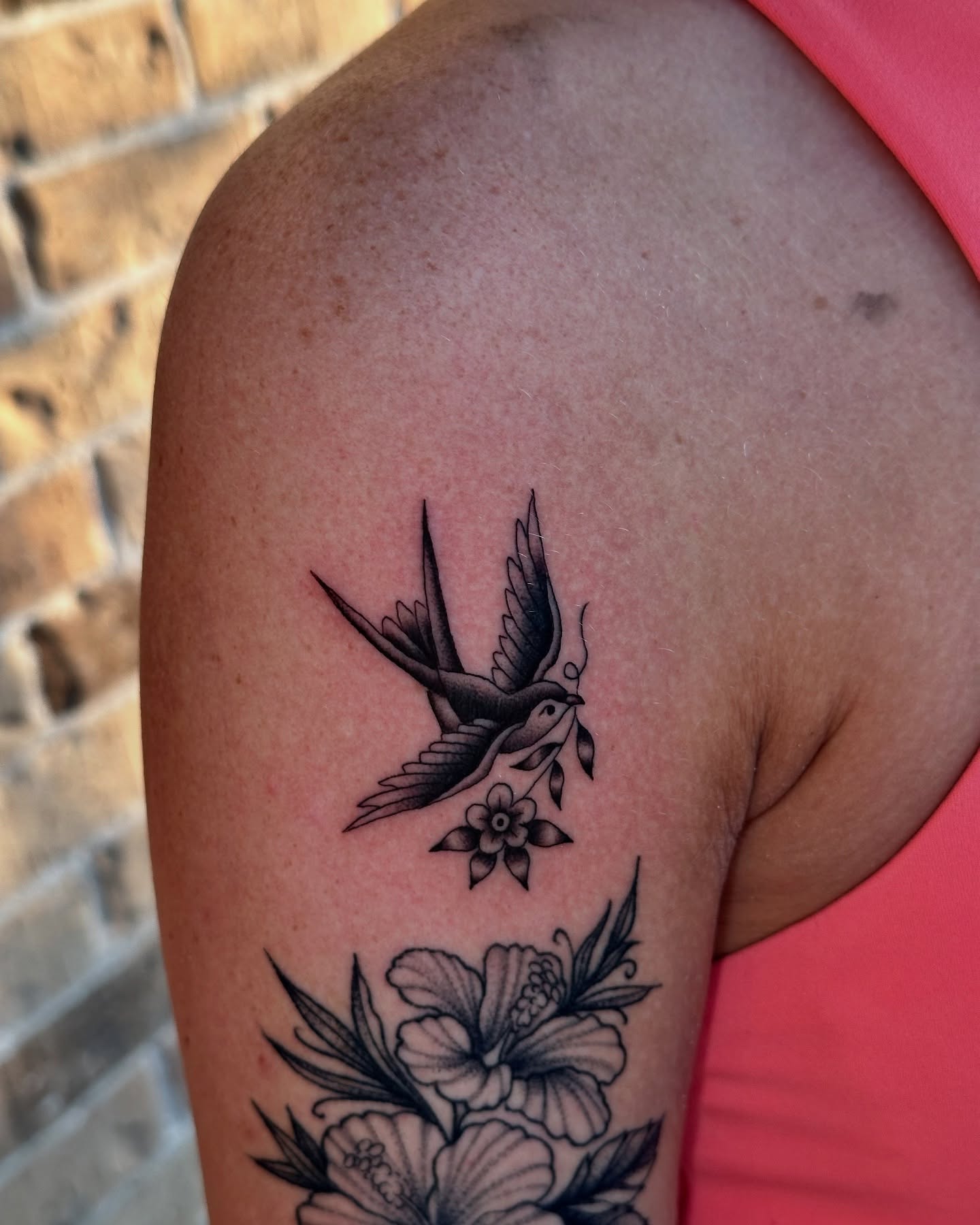Swallow and flower black and grey tattoo on the shoulder by Matthew, Georgetown, Texas