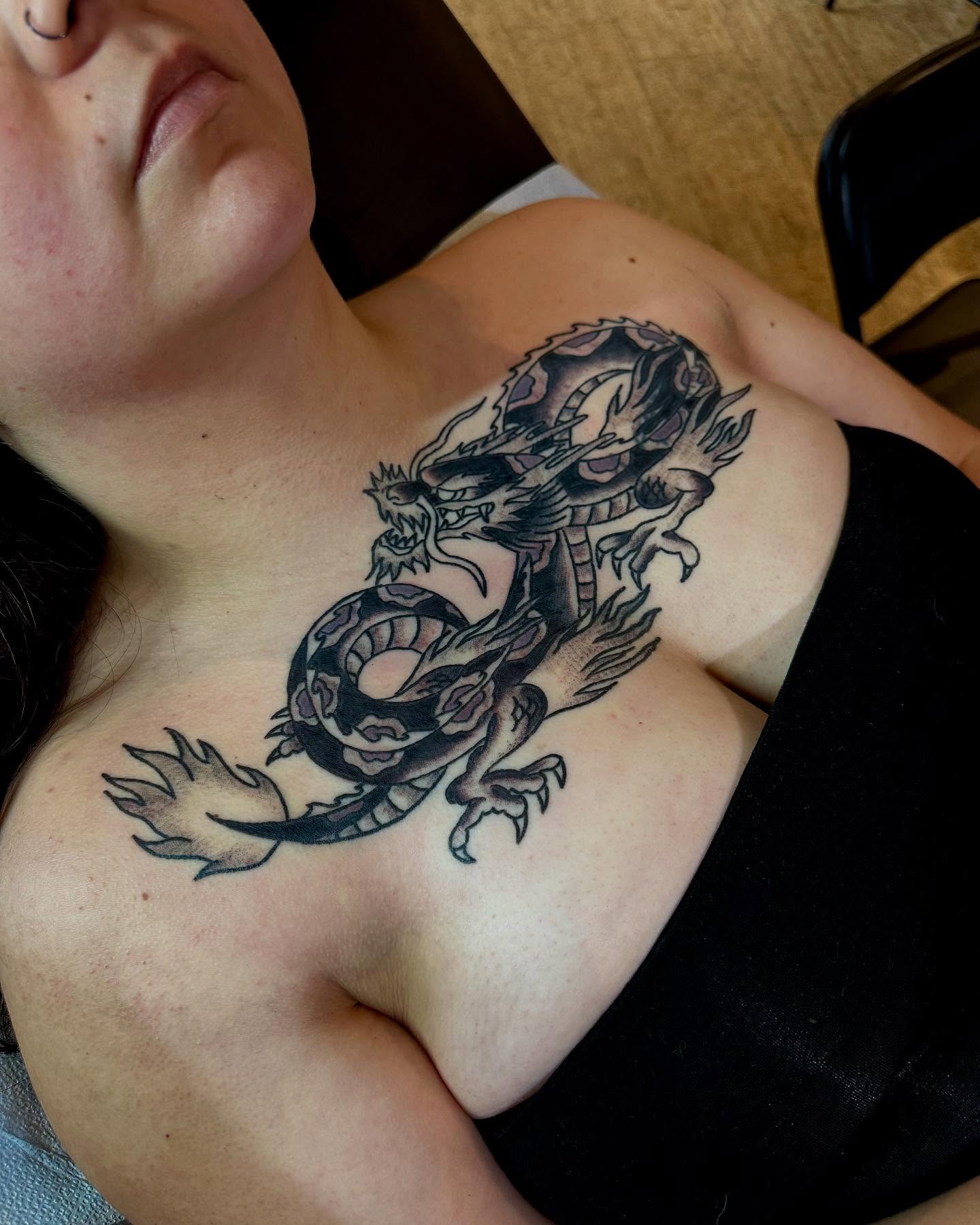 Dragon black and grey tattoo on the chest by teddy, Portland, Oregon
