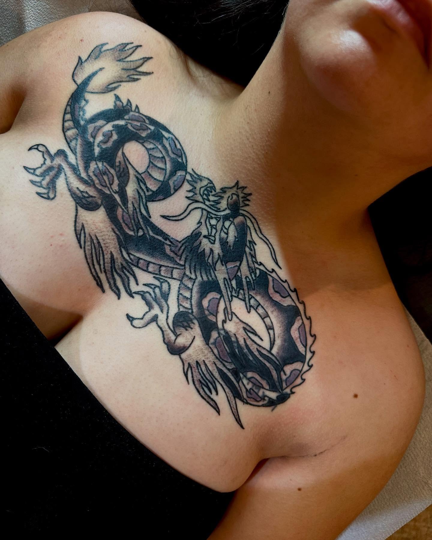 Dragon black and grey tattoo on the shoulder by teddy, Portland, Oregon