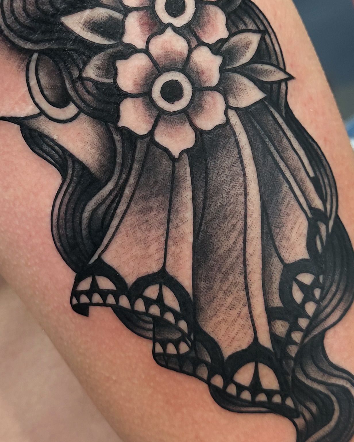 Flower black and grey tattoo on the forearm by Marcos Rivera, Laredo, Texas