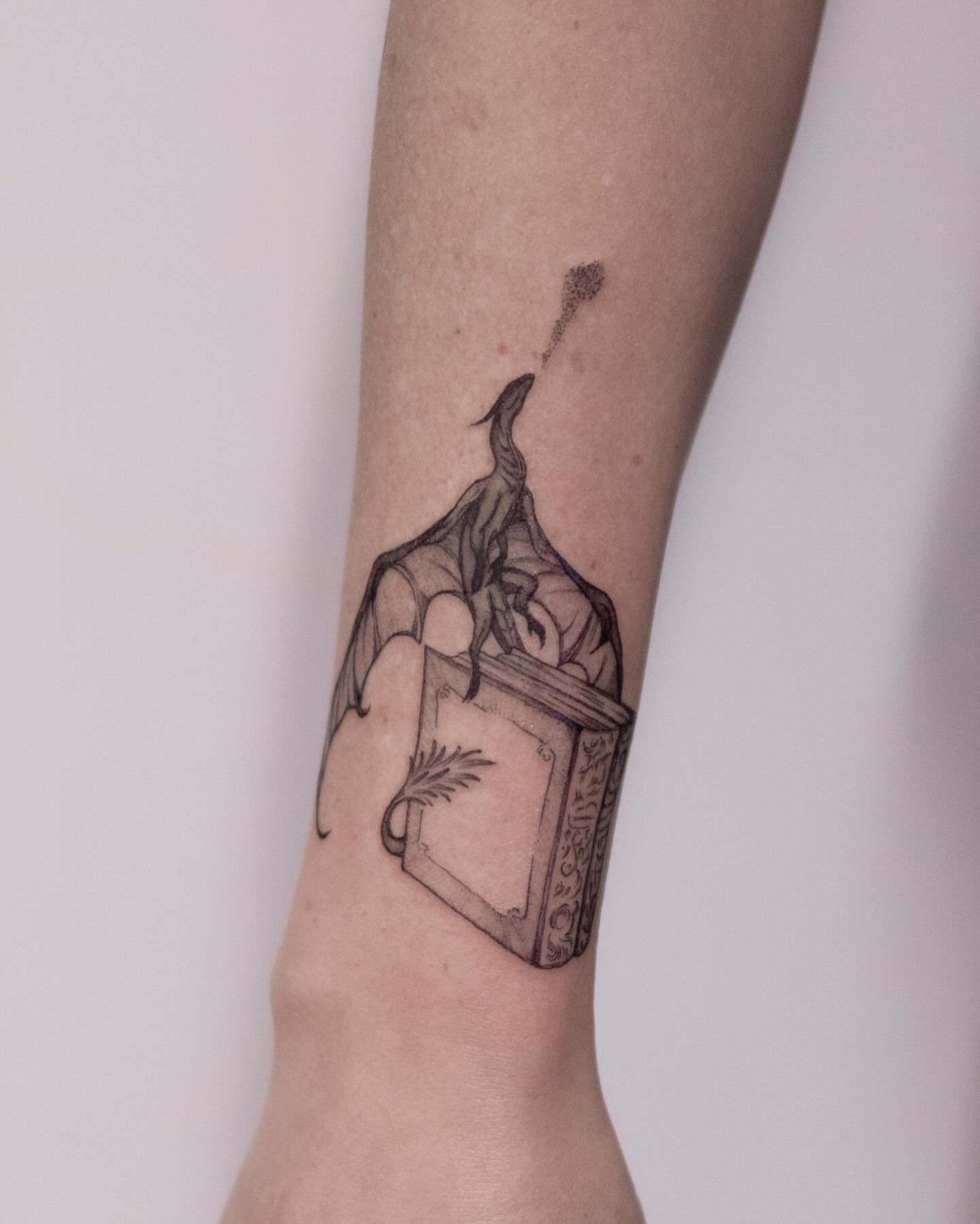 Tattoo by @seraphim.fineline — black_and_grey, realism