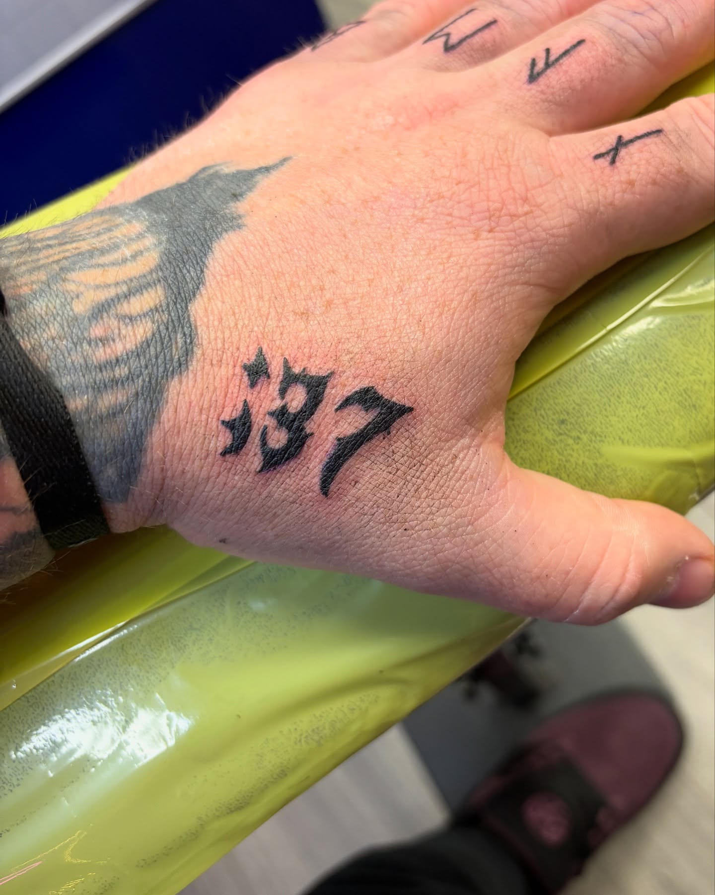 Kanji characters black and grey tattoo on the hand by Tori Anderson, Minneapolis, Minnesota