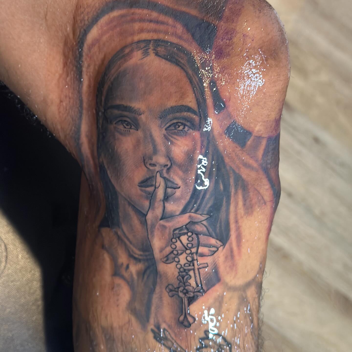 Woman with finger on lips realism tattoo on the forearm by I Am Mawlo! Welcome Fellow Mawlonians