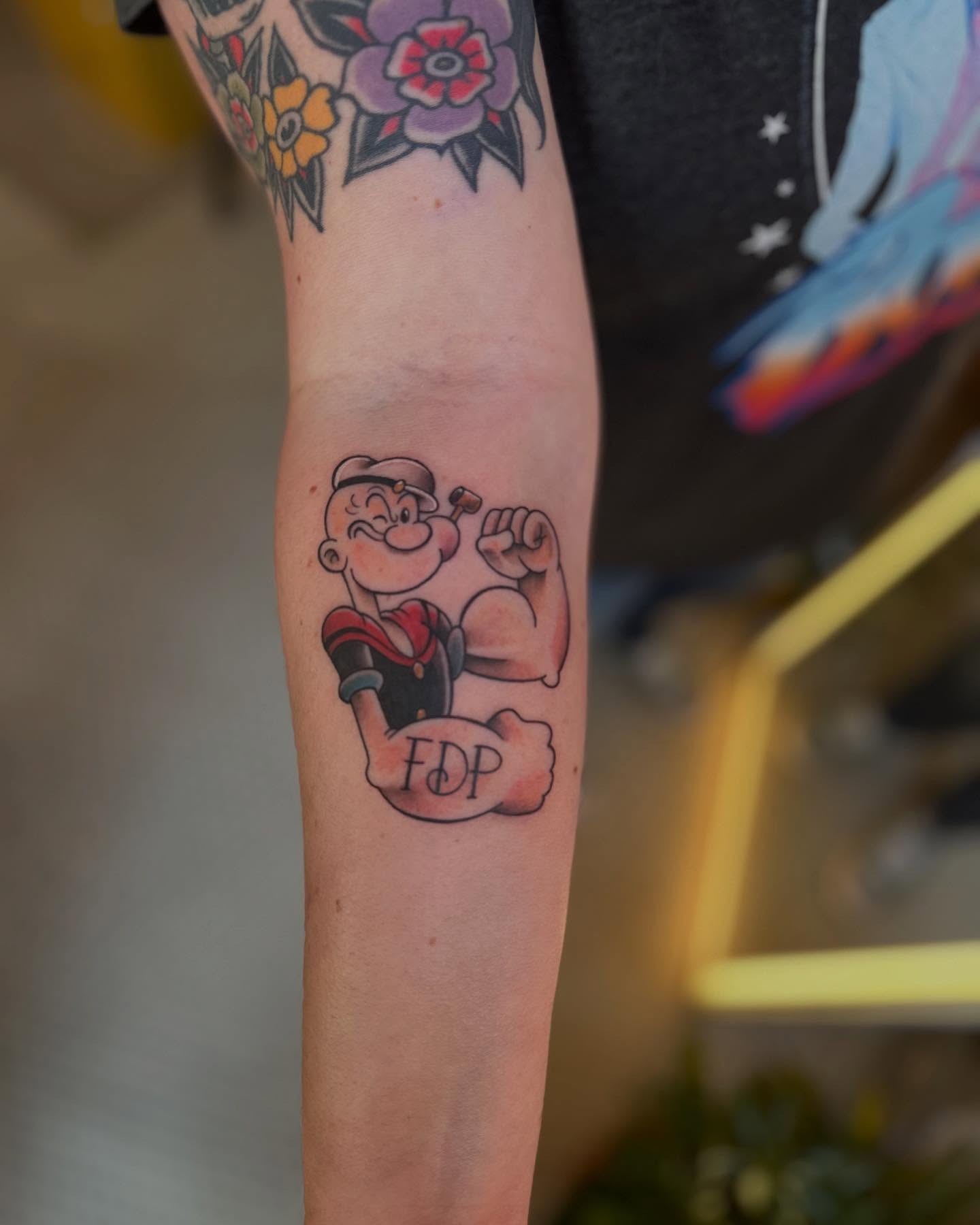 Popeye American traditional tattoo on the forearm by Abigail Townsend