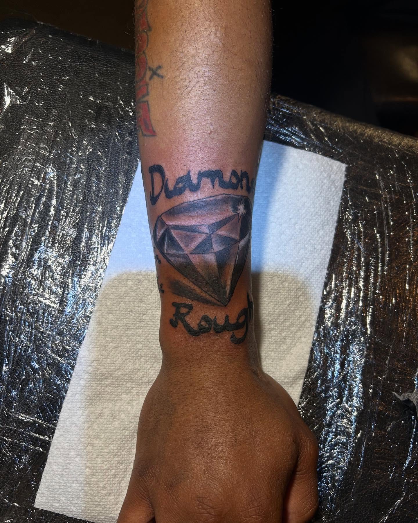 Diamond geometric tattoo on the forearm by Illuminink.gallery