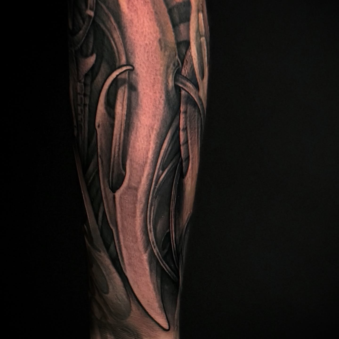 Abstract pattern black and grey tattoo on the forearm by James Hall