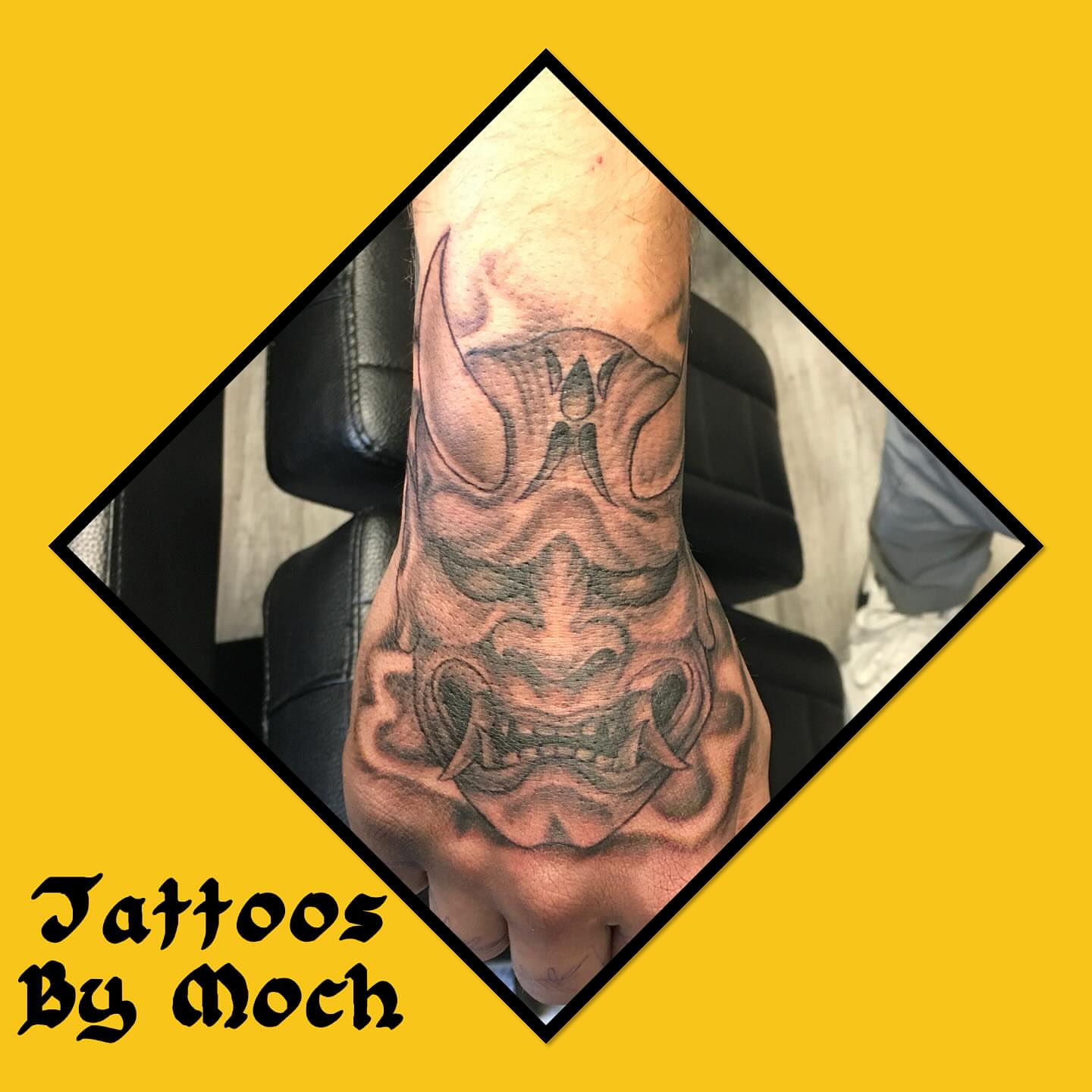 Mask black and grey tattoo on the forearm by Tattoos By Moch, Toledo, Ohio