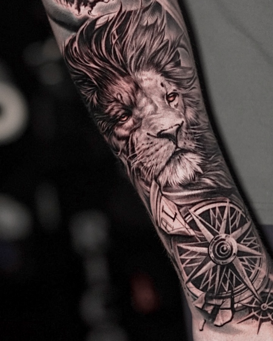 Lion realism tattoo on the forearm by Angel Gonzalez