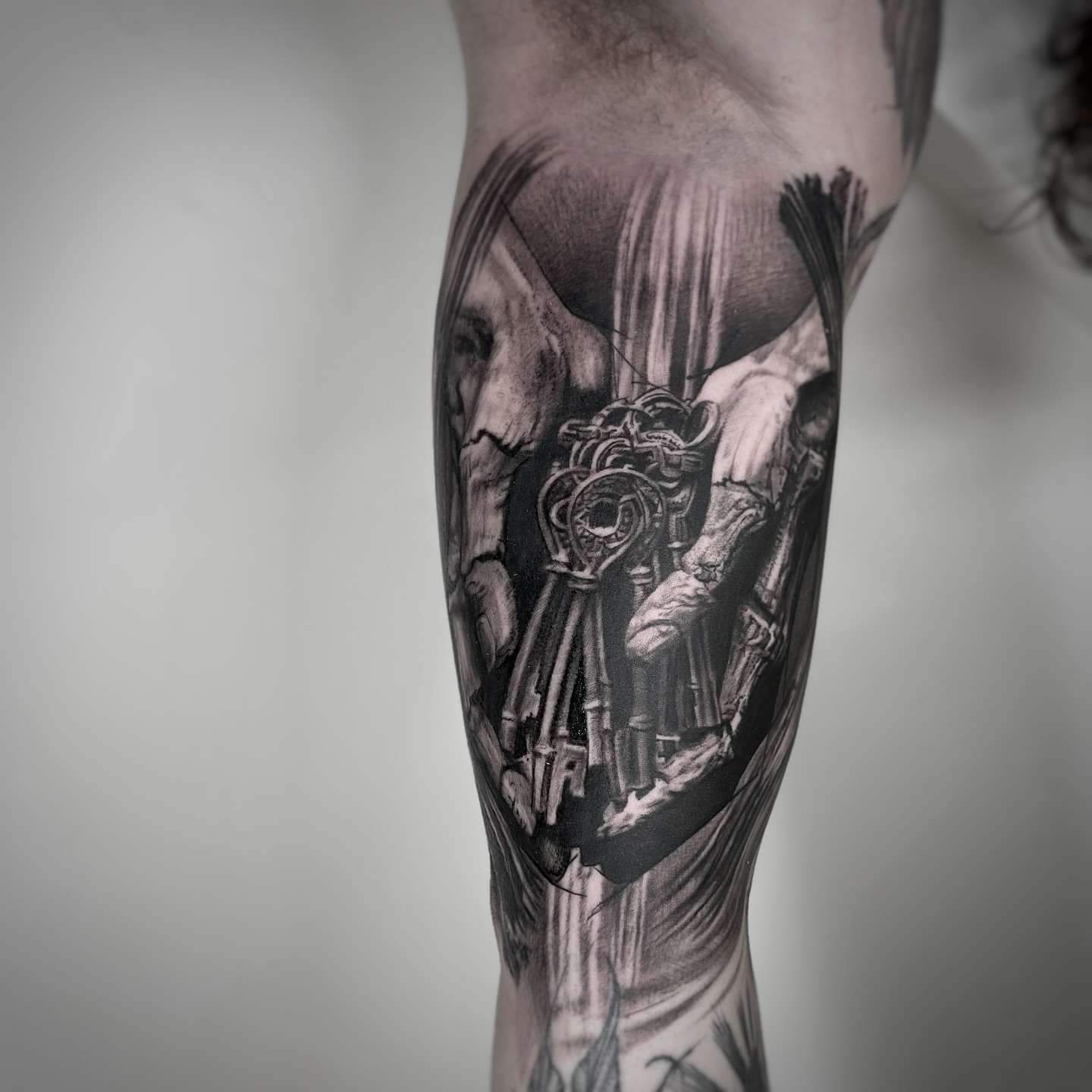 Keys and skeleton realism tattoo on the forearm by Paige Jean