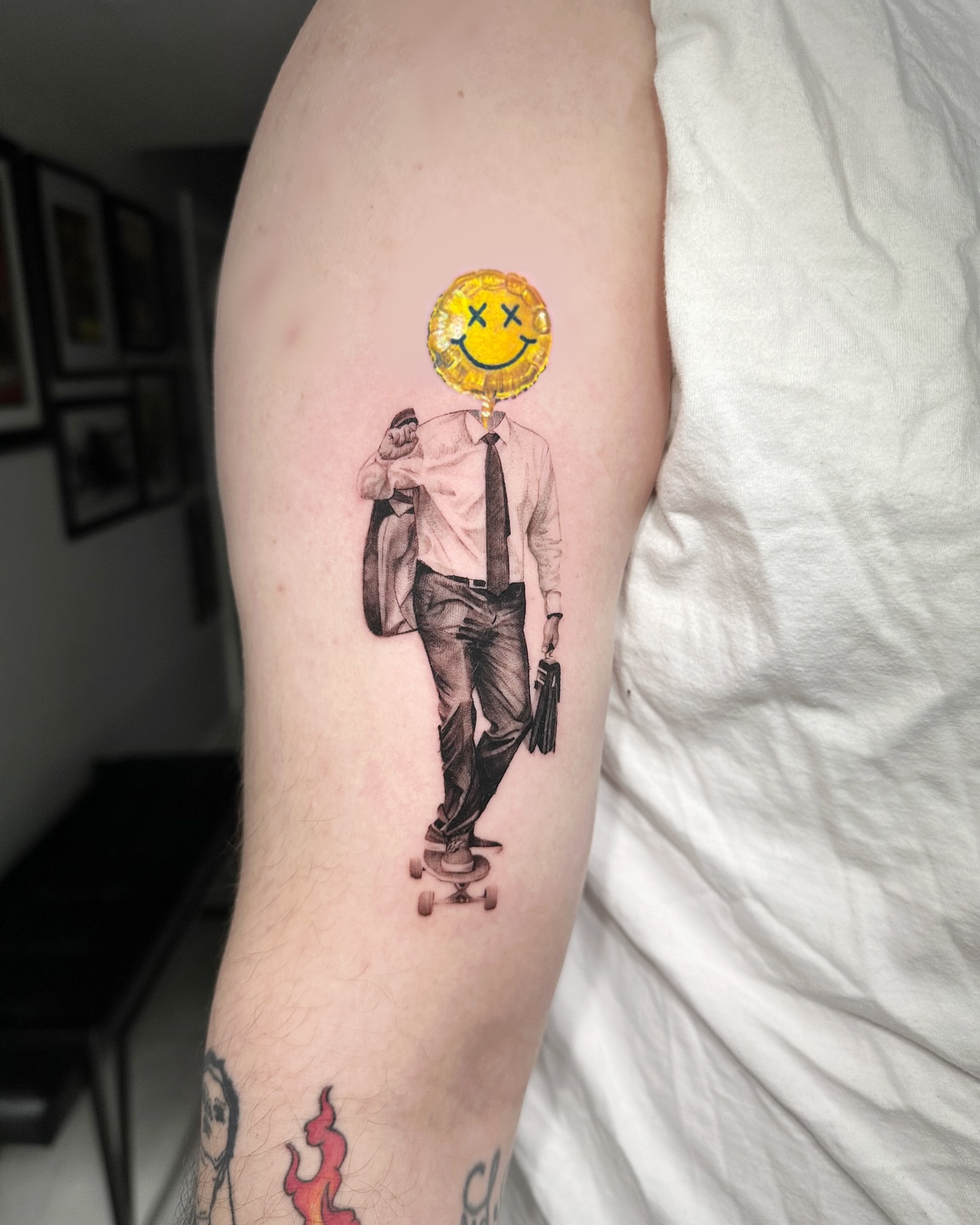 Skateboarding businessman realism tattoo on the forearm by Bay Area Tattoo Artist