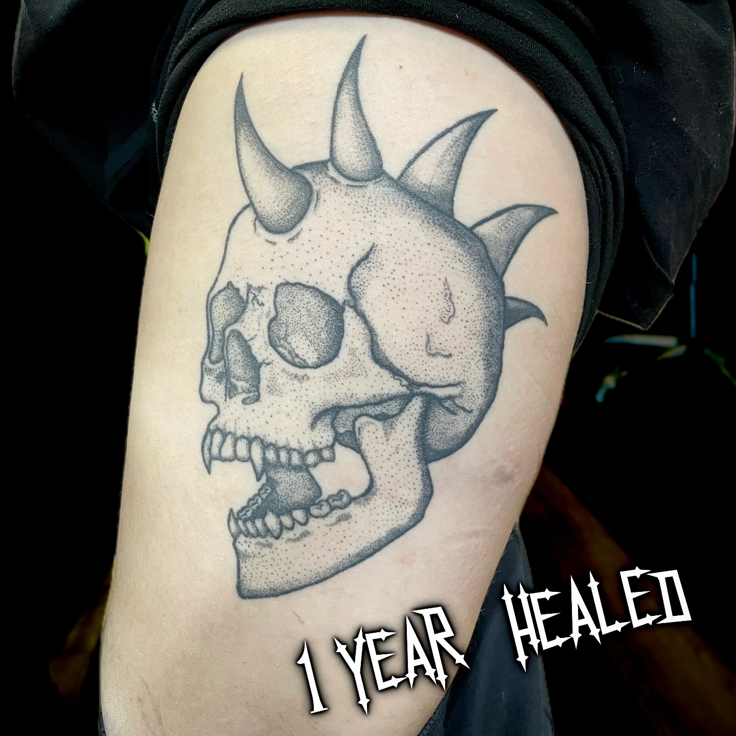 Skull with horns dotwork tattoo on the thigh by Shontel Fowler