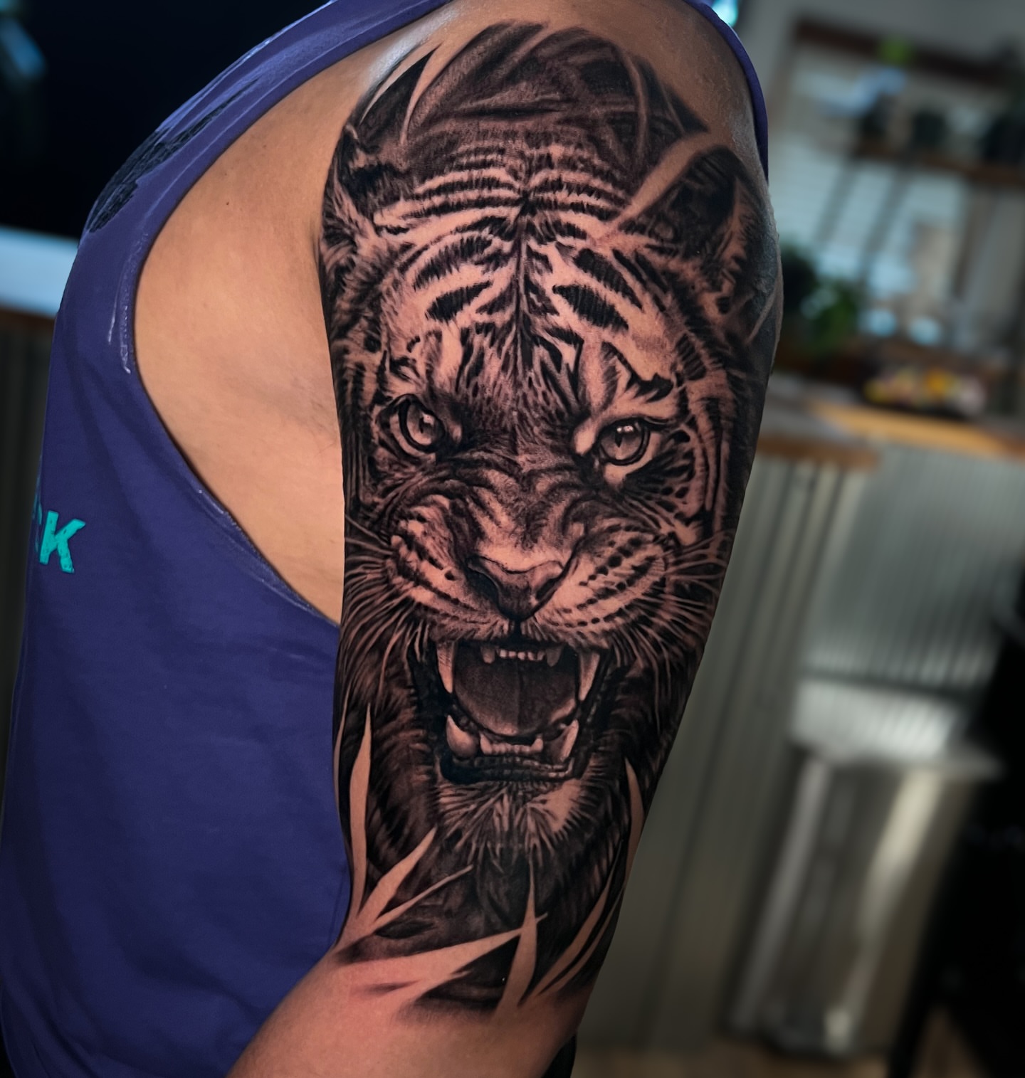 Tiger realism tattoo on the forearm by Aaron, Milwaukee, Wisconsin