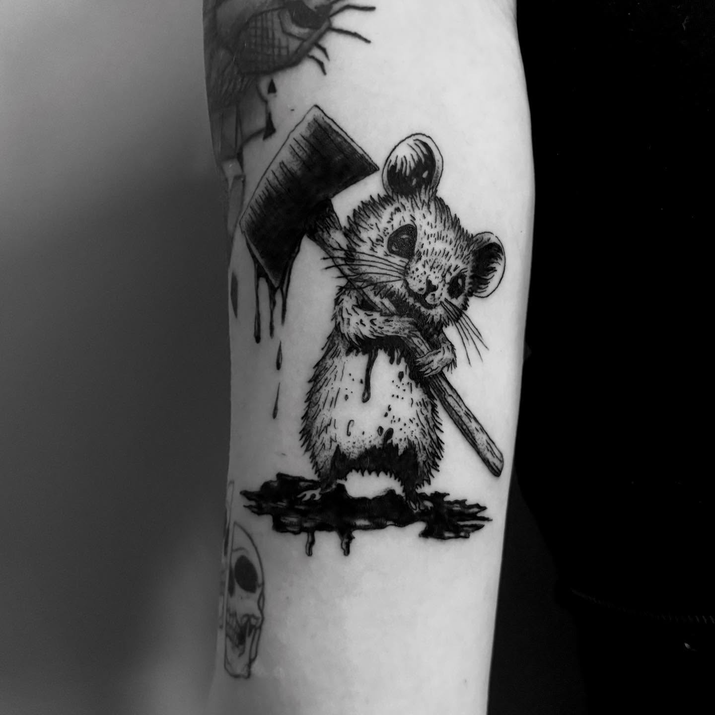Mouse with axe realism tattoo on the forearm by Bryan Black