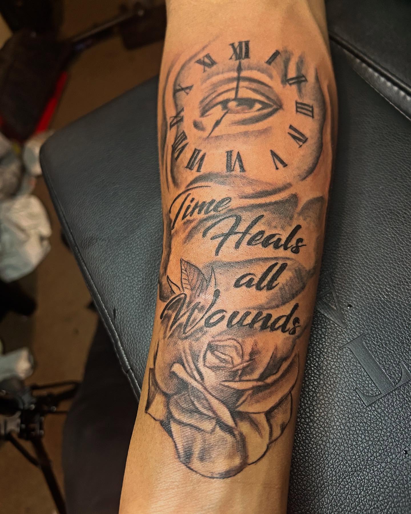 Time heals all wounds realism tattoo on the forearm by Detroit tattoo Artist