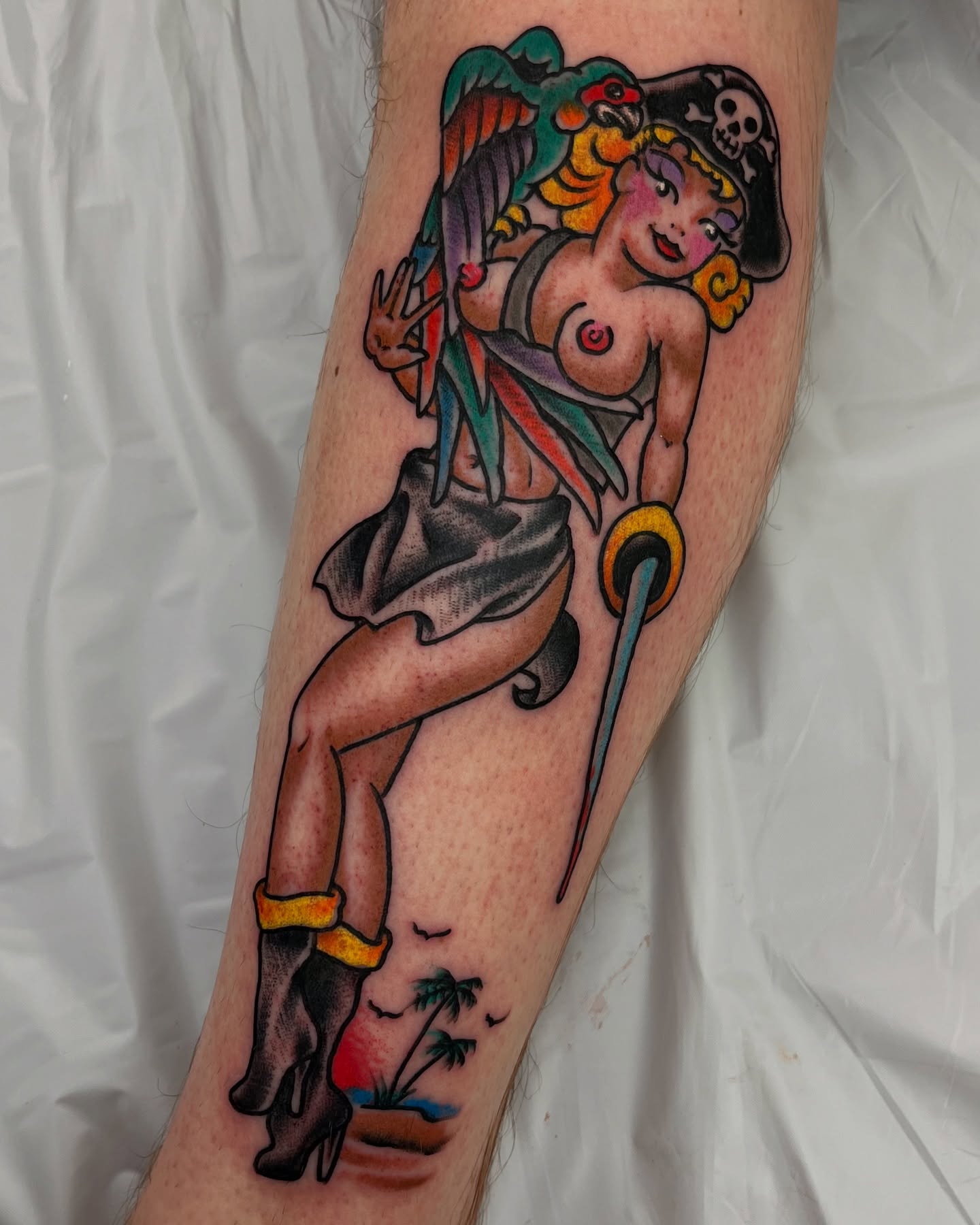 Pirate pin-up girl American traditional tattoo on the forearm by Steve Tiberi
