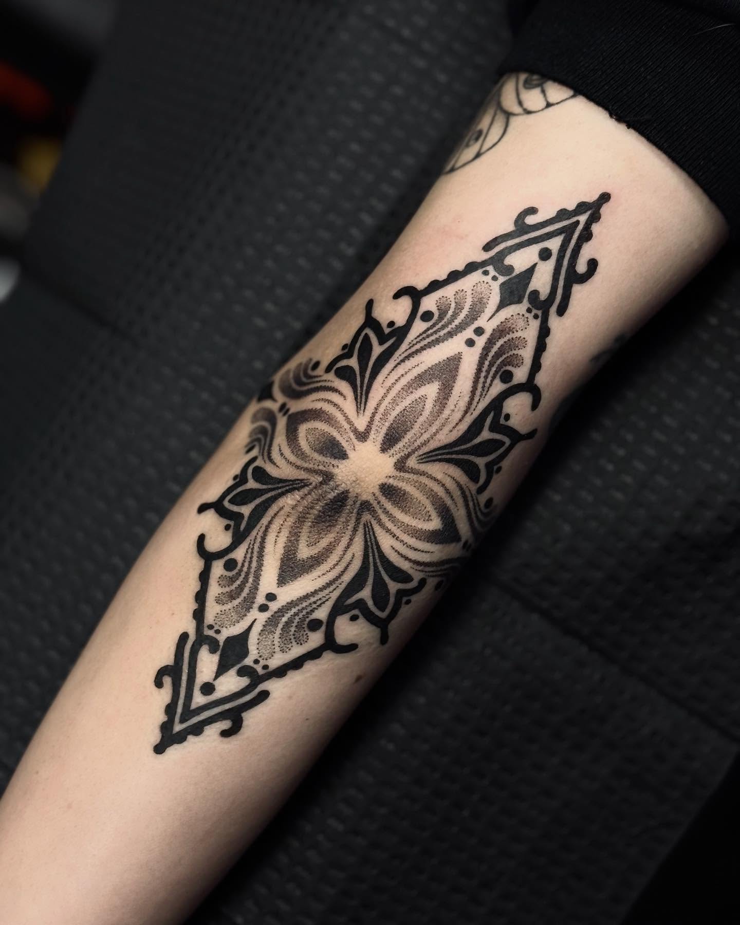 Floral mandala dotwork tattoo on the forearm by Taylor Elizabeth 🕉️