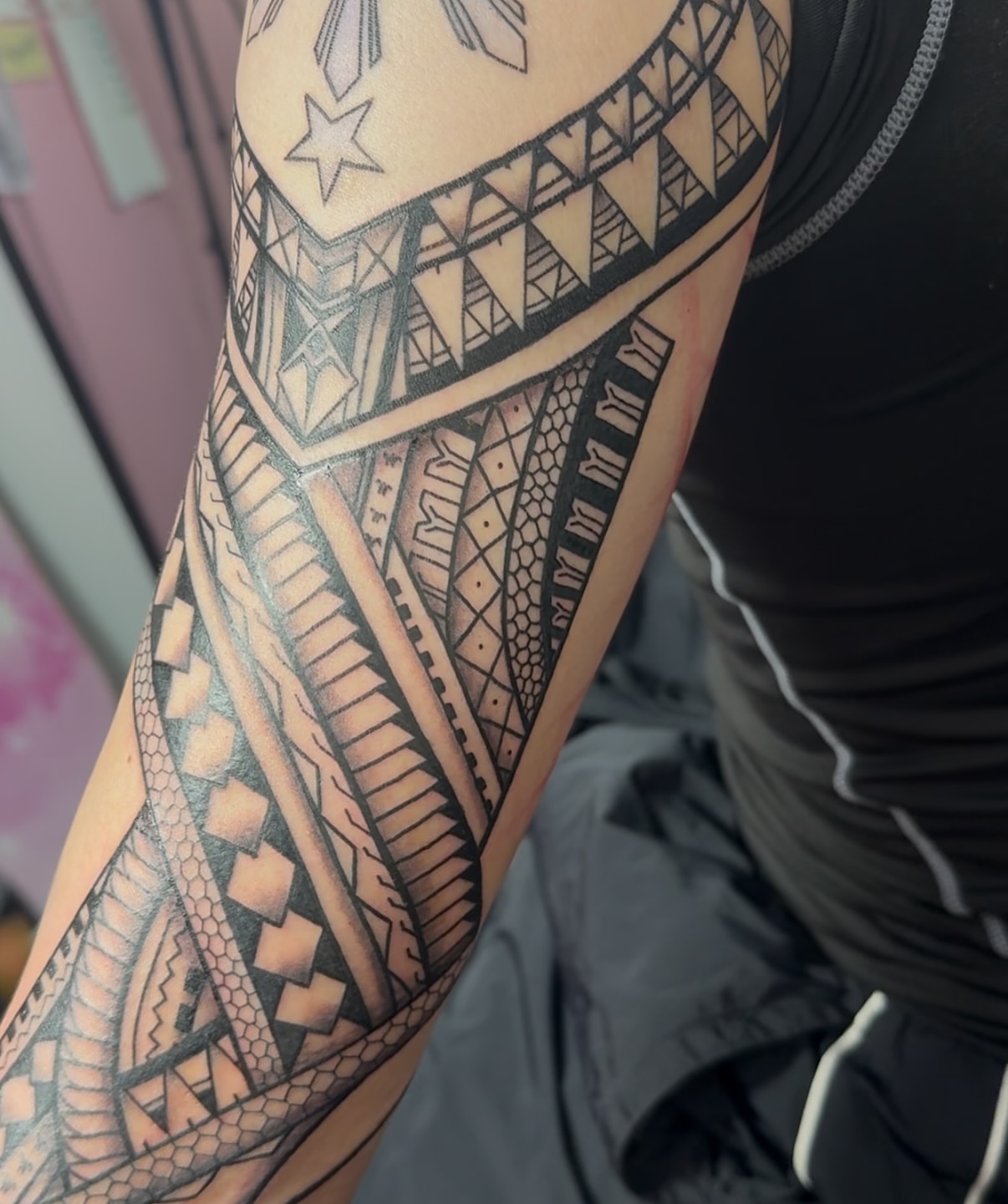Tribal pattern tribal tattoo on the forearm by Ivy lee