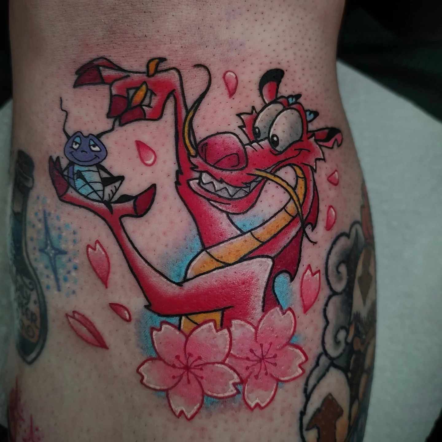 Chinese dragon and turtle American traditional tattoo on the forearm by Hope Higgins