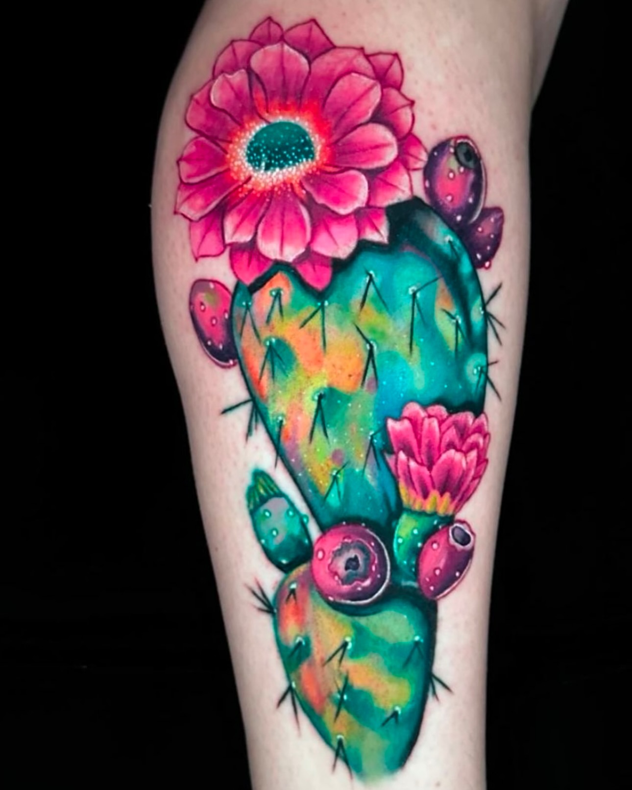 Cactus with flowers watercolor tattoo on the forearm by Goga