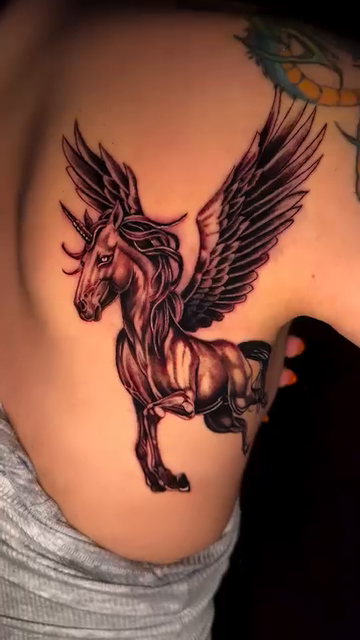 Pegasus neo-traditional tattoo by Travis Sleeper