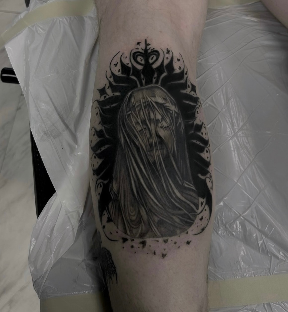 Woman with long hair realism tattoo on the forearm by Anahi