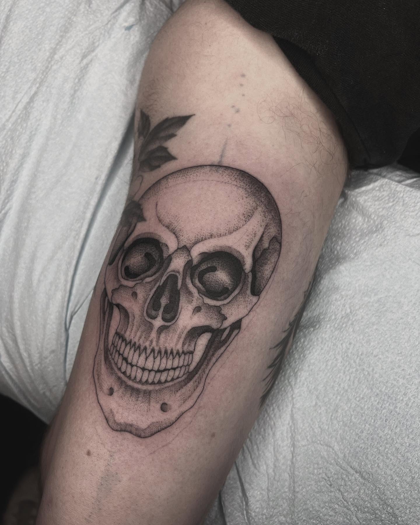 Skull dotwork tattoo on the forearm by linahsiaotattoo