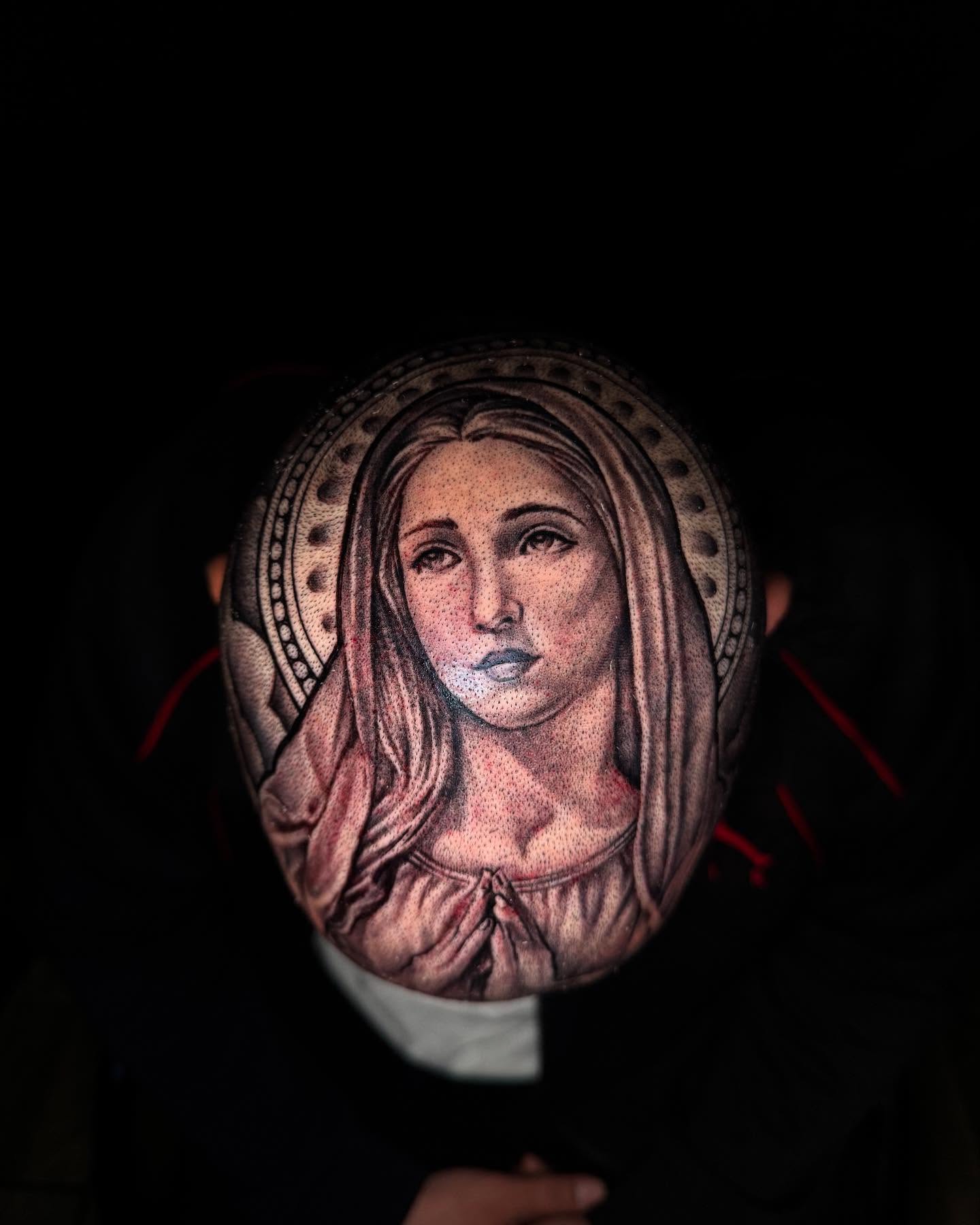 Religious figure dotwork tattoo on the head by Tattoos By Chico
