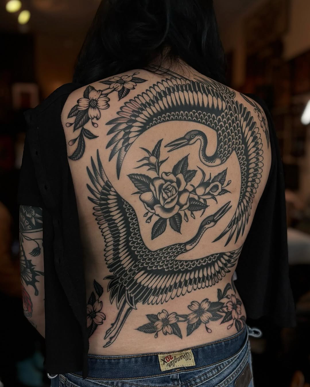 Cranes and roses tribal tattoo on the back by Jesse Smith, Chicago, Illinois