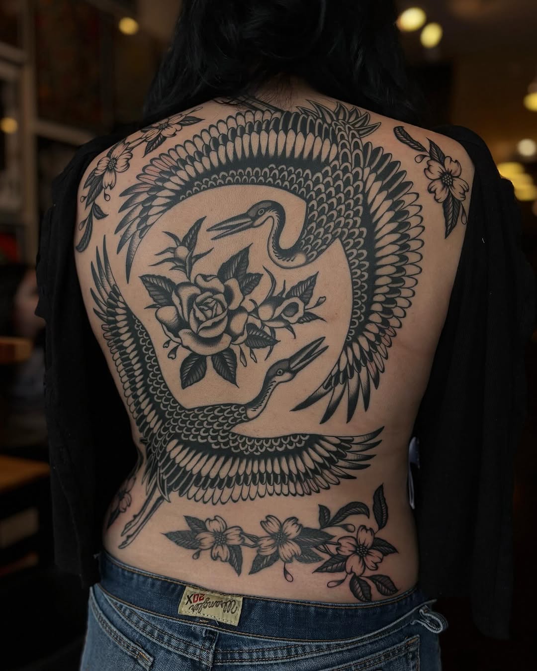Cranes and roses tribal tattoo on the back by Jesse Smith, Chicago, Illinois