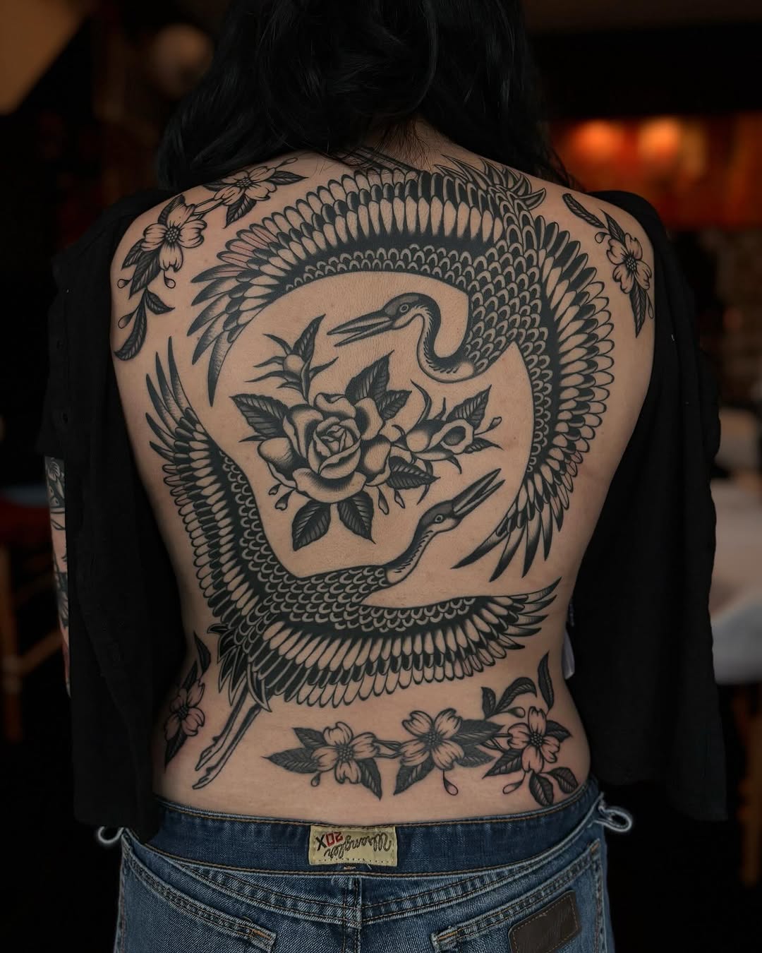 Cranes and roses tribal tattoo on the back by Jesse Smith, Chicago, Illinois