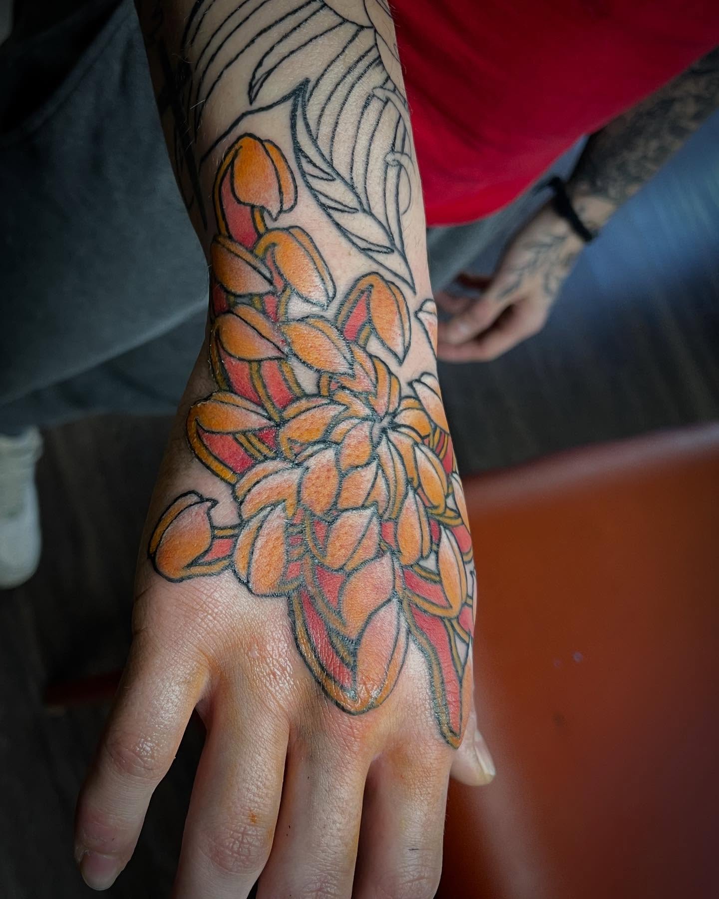 Flower geometric tattoo on the hand by Jaxson Eugene Brady-Hobart