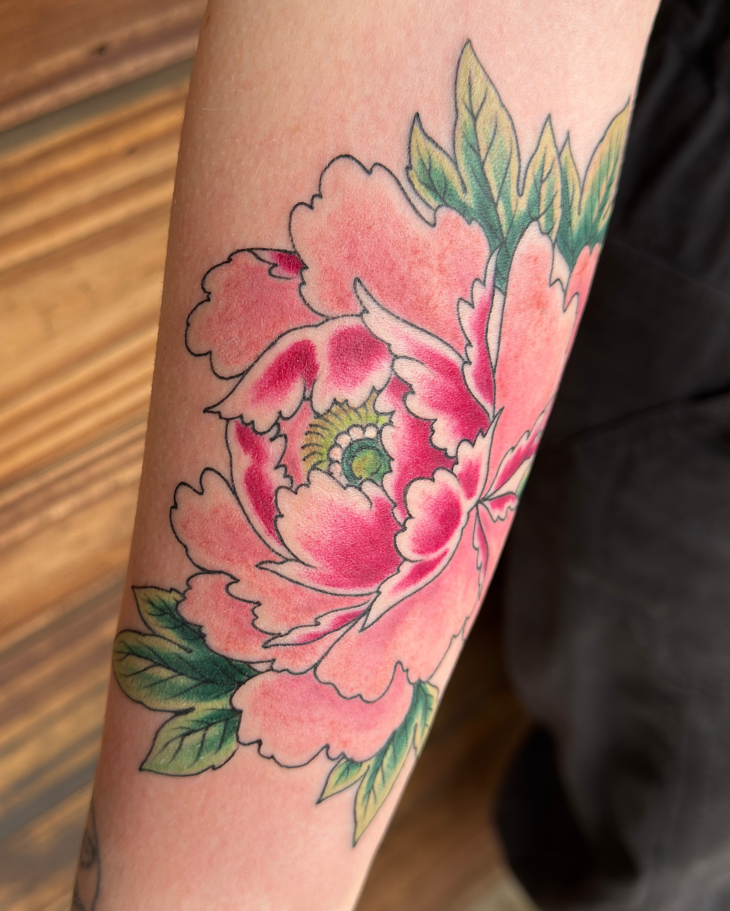 Peony new school tattoo on the forearm by Scott Kulikowski