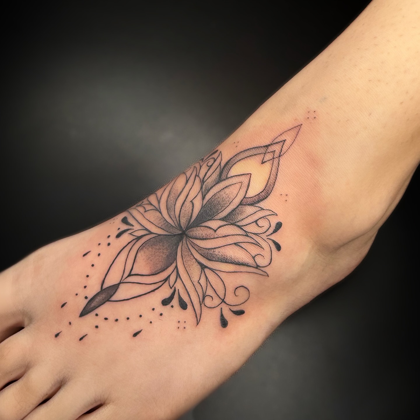 Lotus flower dotwork tattoo on the foot by ᴍᴀɢɢɪᴇ ✧, Las Vegas, Nevada