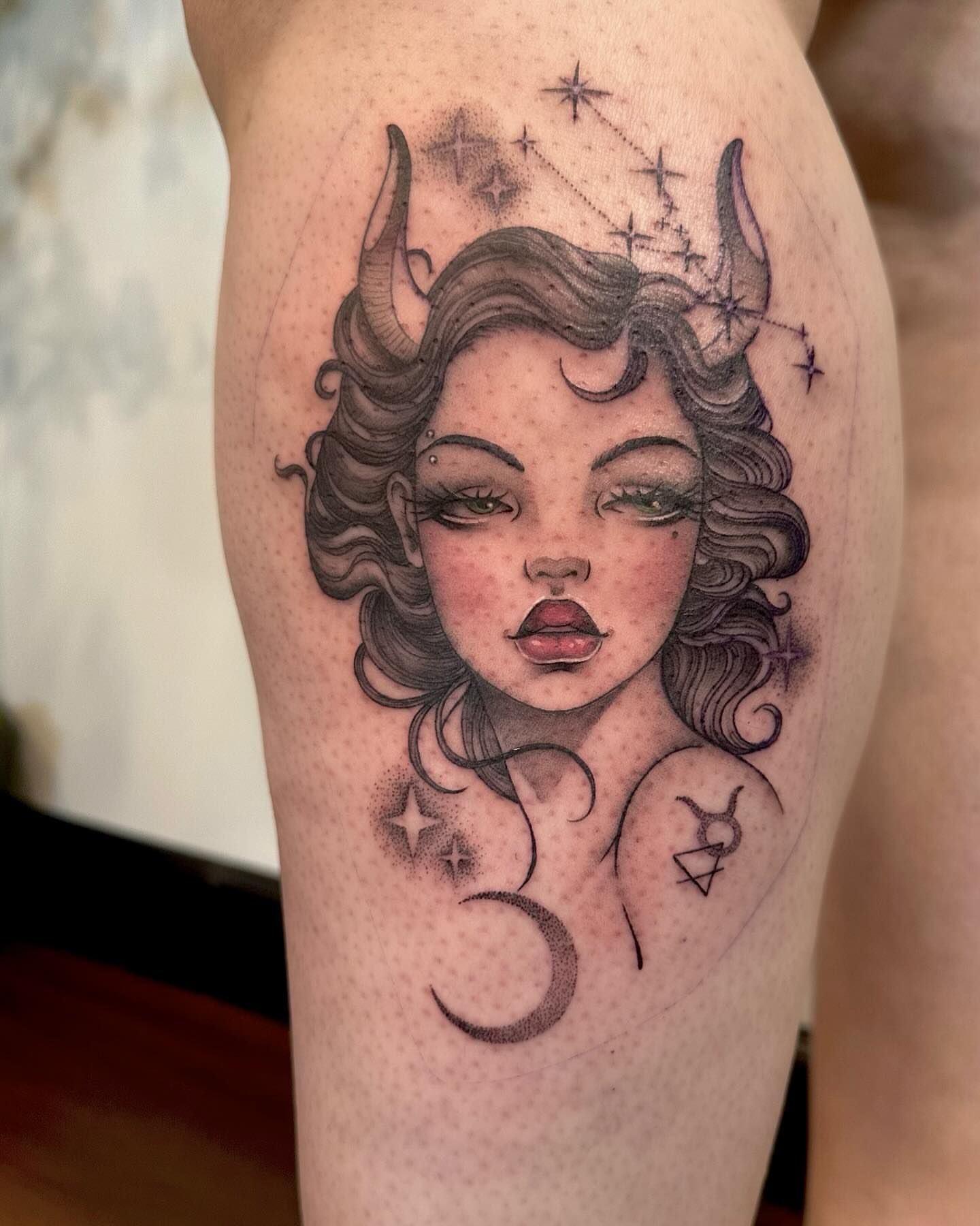 Woman with horns dotwork tattoo on the thigh by Kate Darling