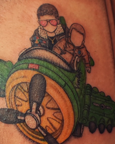 Cyborg pilot and robot neo-traditional tattoo on the forearm by Alexandria Gudiel