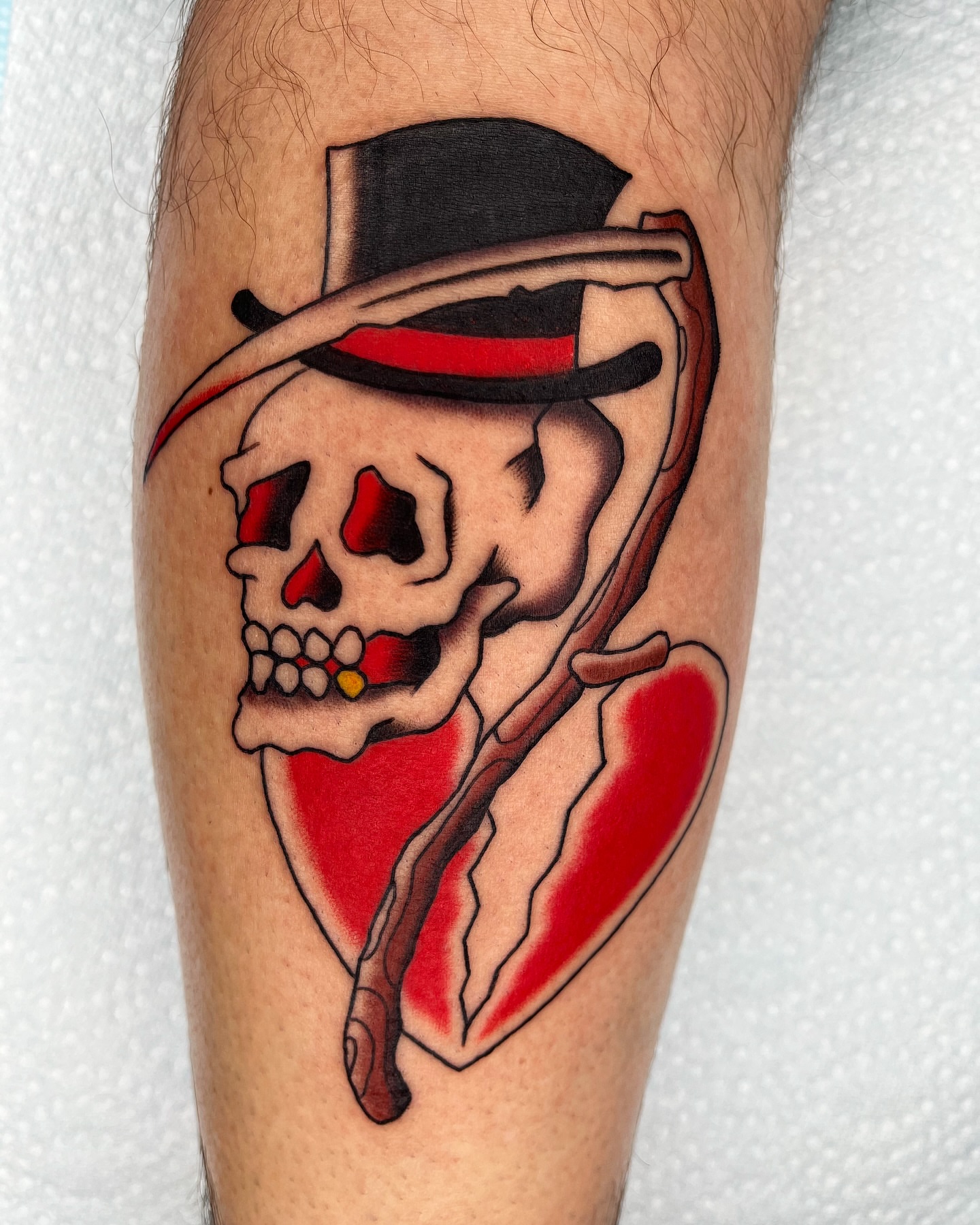 Skull wearing top hat American traditional tattoo on the forearm by Pedroux M.