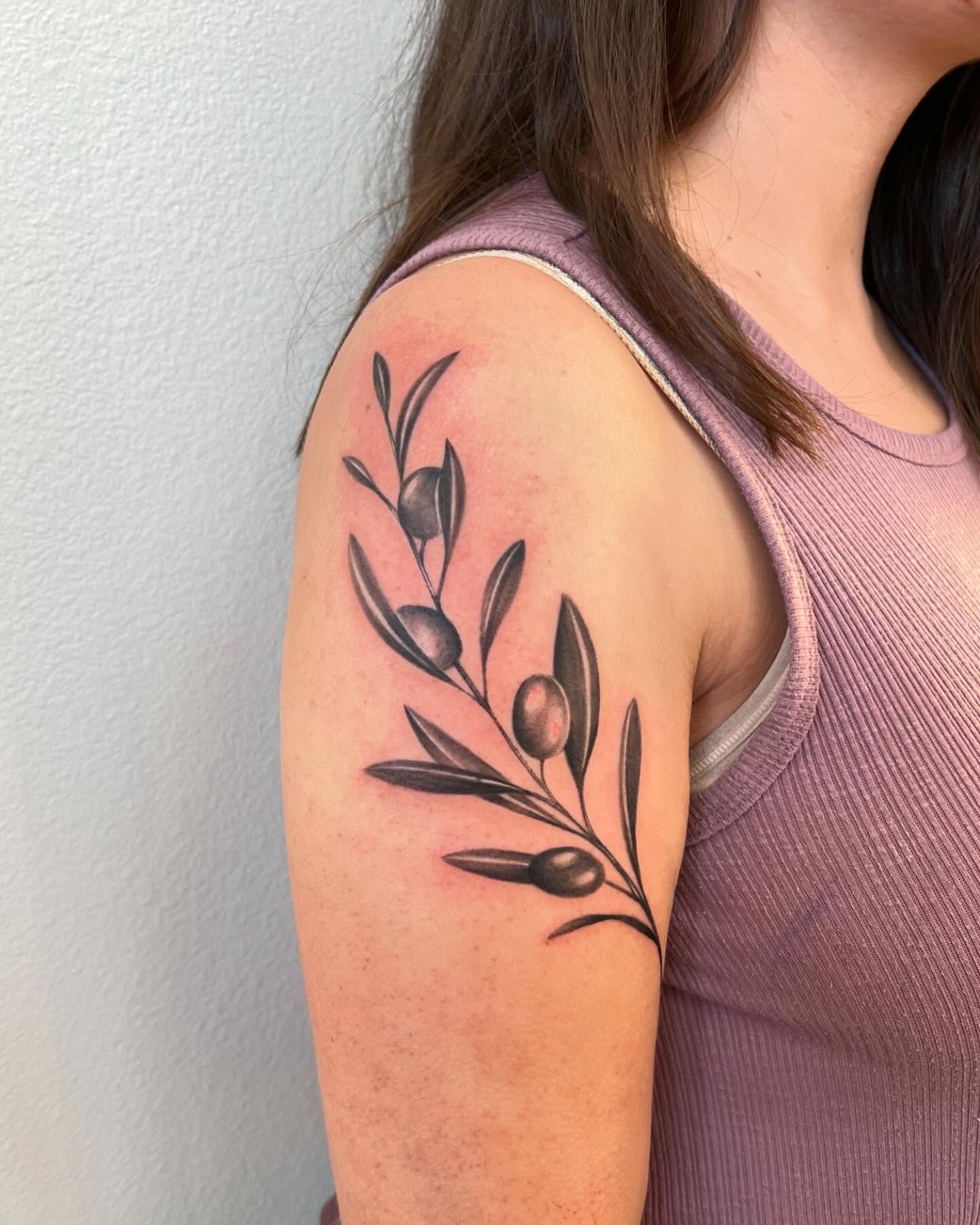 Olive branch black and grey tattoo on the upper arm by San Diego Fineline Black & Grey Tattoo Artist
