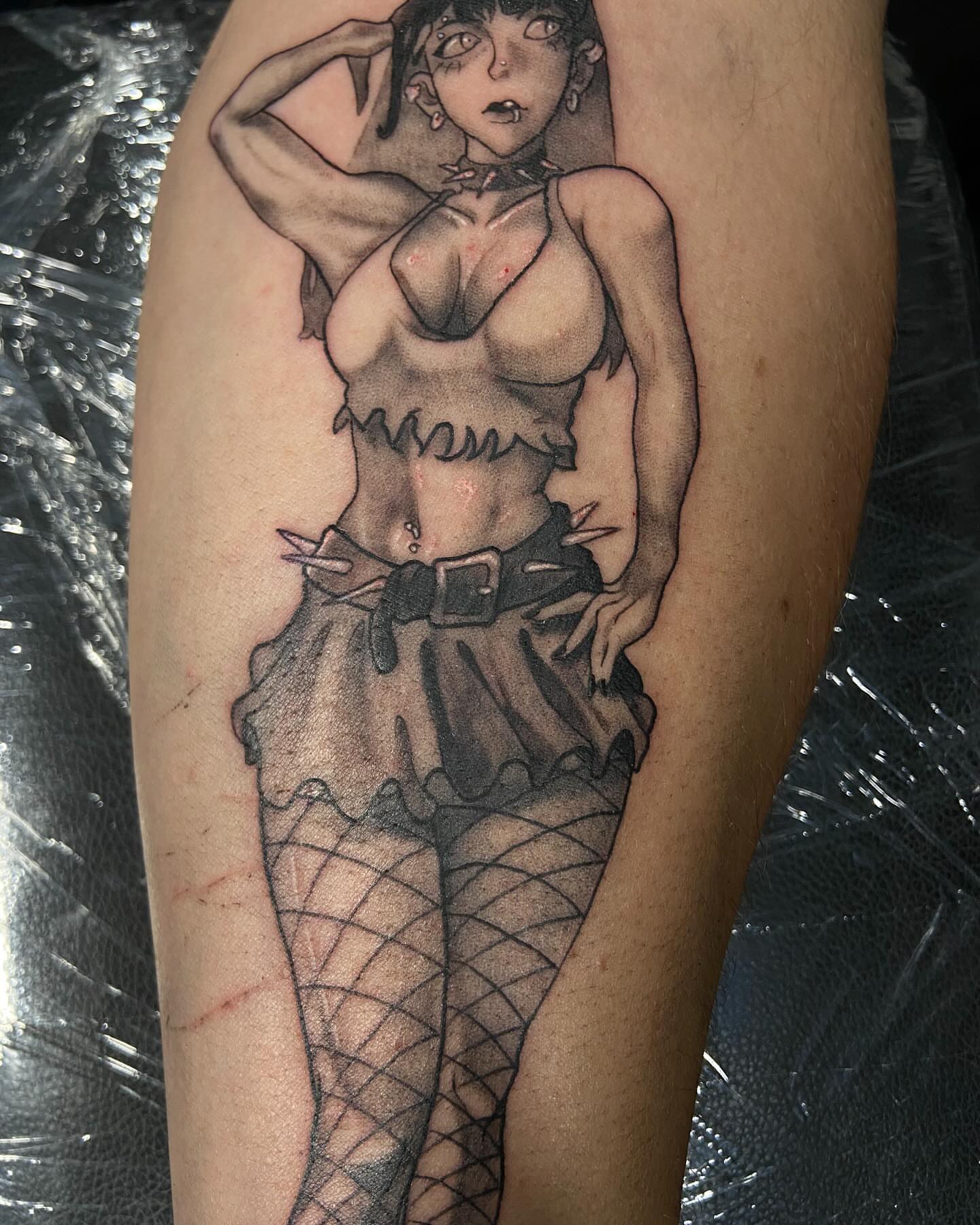 Anime character anime tattoo on the thigh by Slade Nowicki