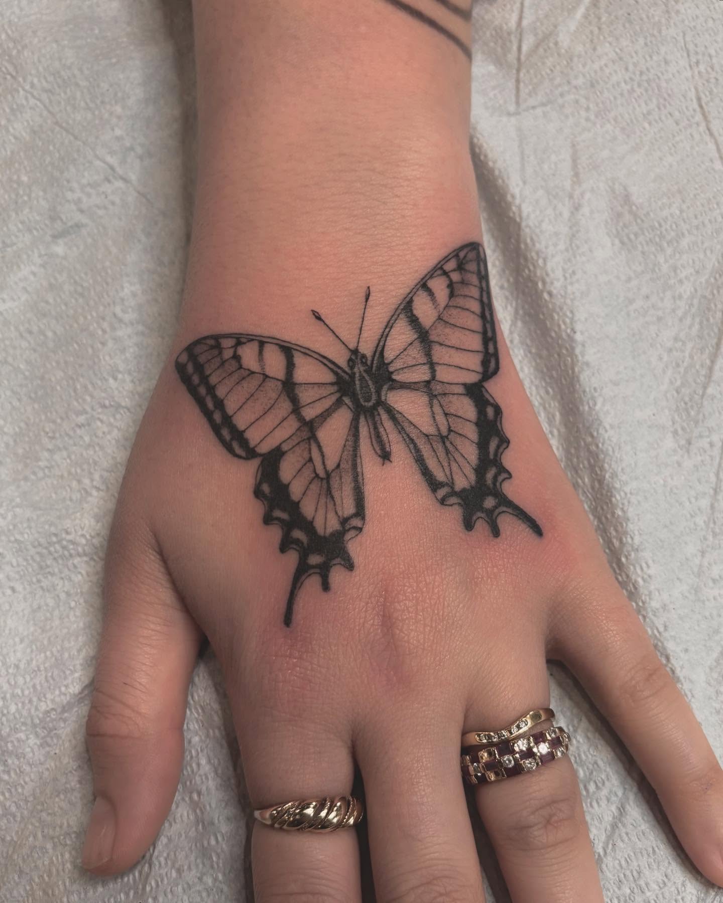 Butterfly black and grey tattoo on the hand by Jake Hodson, Nashville, Tennessee