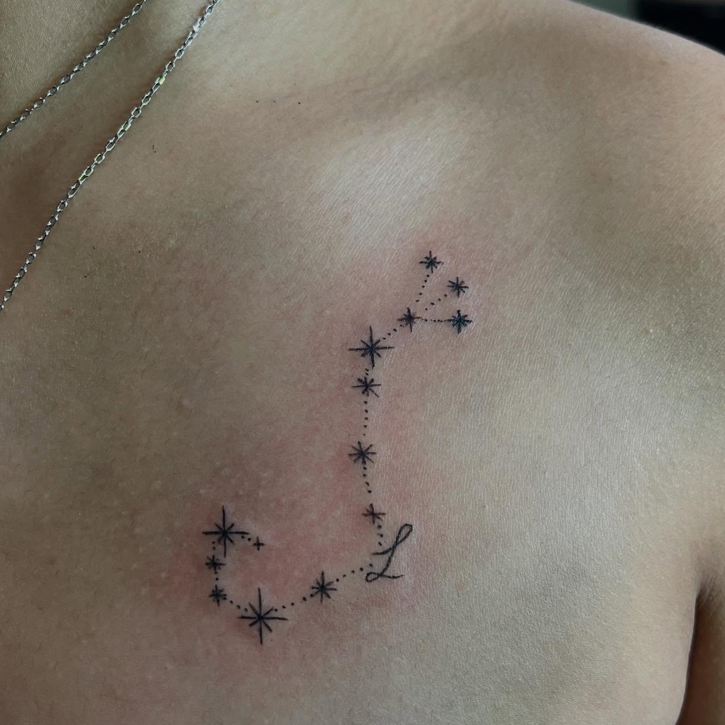 Constellation dotwork tattoo on the chest by Kai