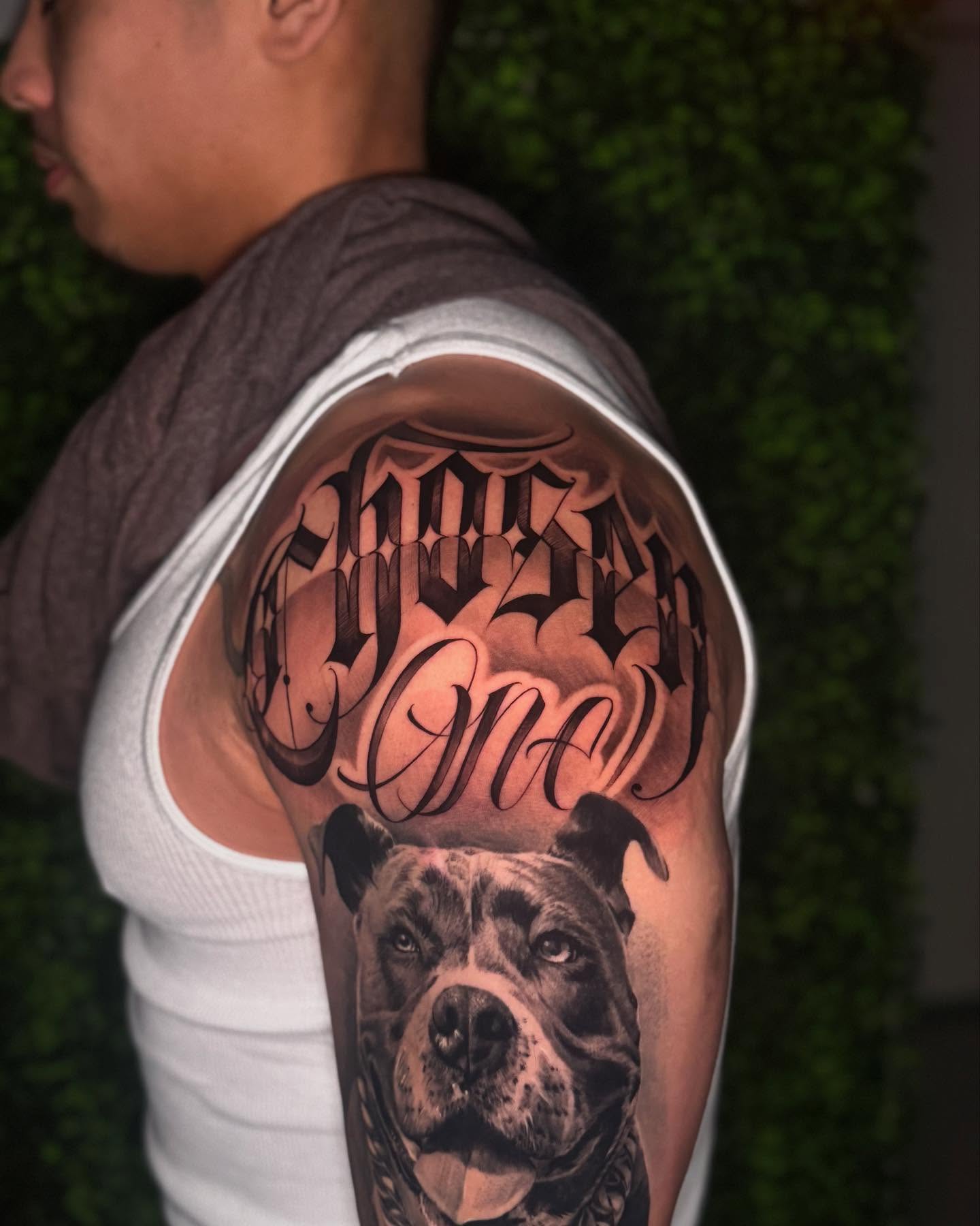Pit bull realism tattoo on the upper arm by Sena Sim 🇰🇭, Worcester, Massachusetts