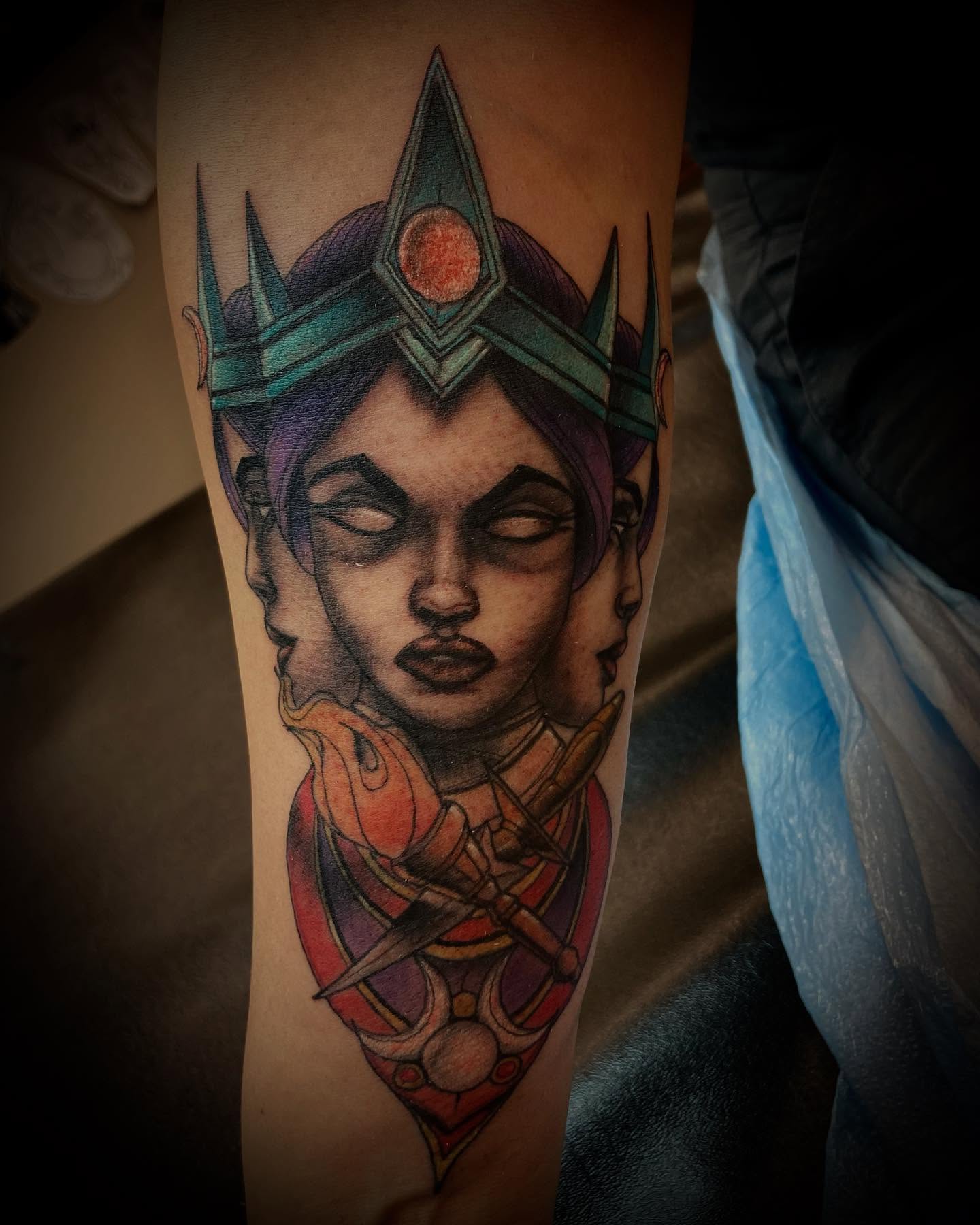 Female warrior geometric tattoo on the forearm by Bobby Trefz