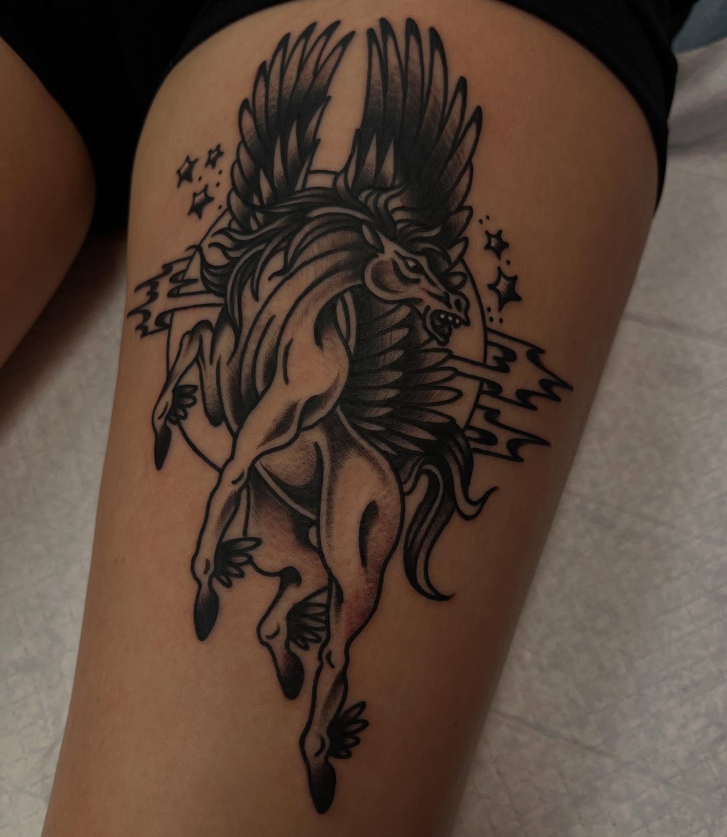 Winged horse black and grey tattoo on the thigh by Lee Brewster, Erlanger, Kentucky
