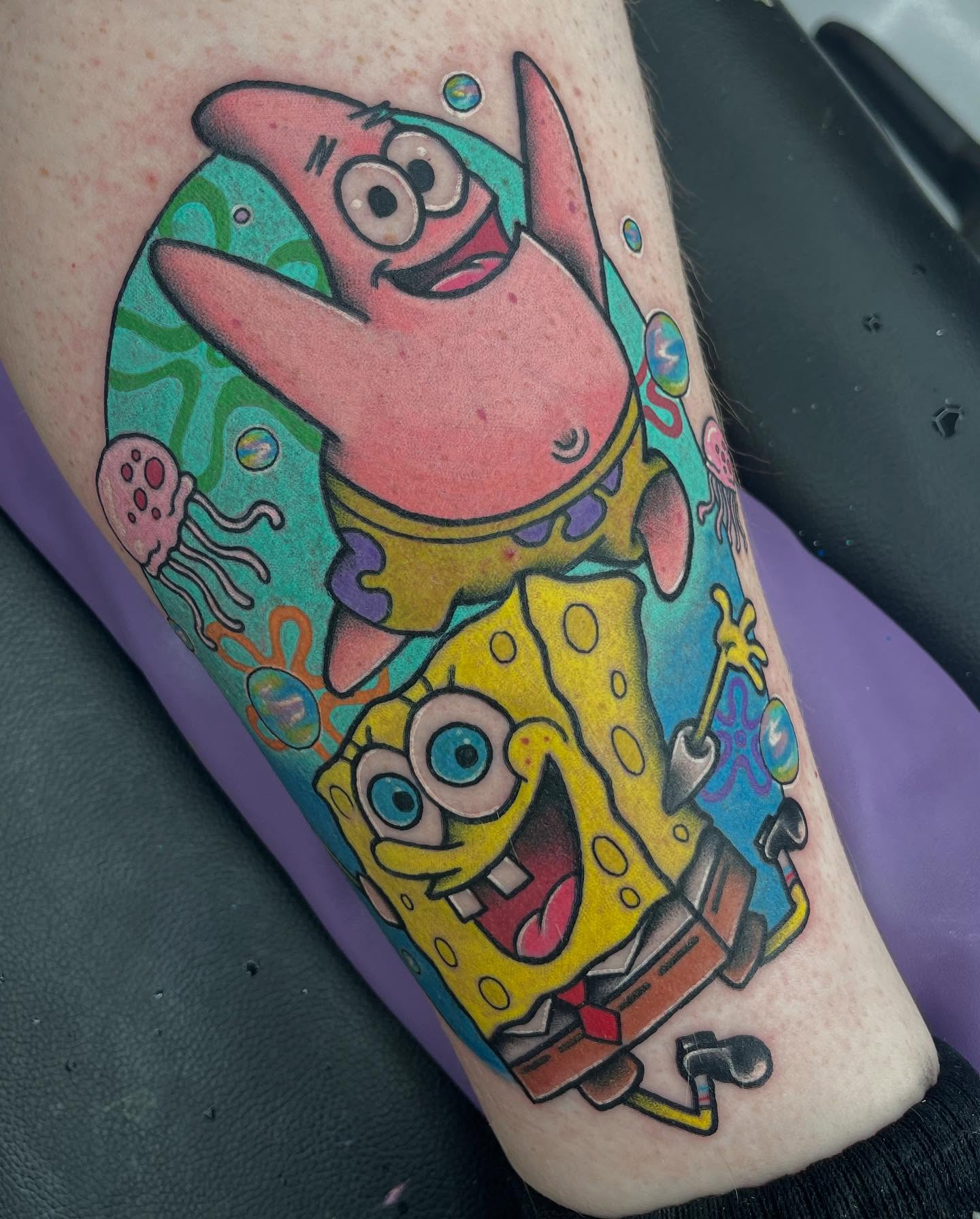 Spongebob and patrick new school tattoo on the forearm by Autumn Fulford